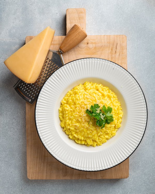 How to Prepare a Gourmet Wild Mushroom Risotto with a Drizzle of Truffle Oil?