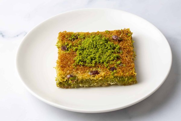 How to Create a Gourmet Spinach and Ricotta Stuffed Chicken Breast with a Creamy Sauce?